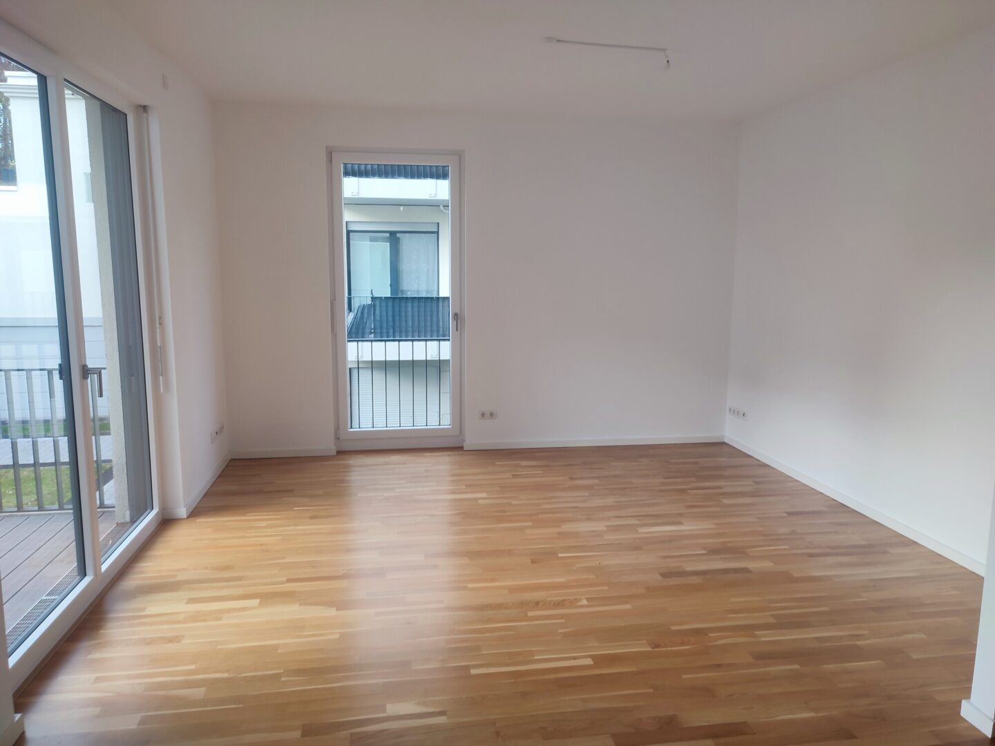 Wohnzimmer + Balkon