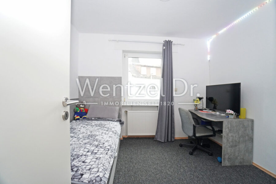 Attraktive Obergeschosswohnung in bester, zentraler Lage von Walluf - Kinderzimmer 1