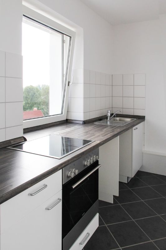 Atemberaubener Blick! Schöne Wohnung mit tollem Ausblick über Ahrensburg - Beispielbild: Küche