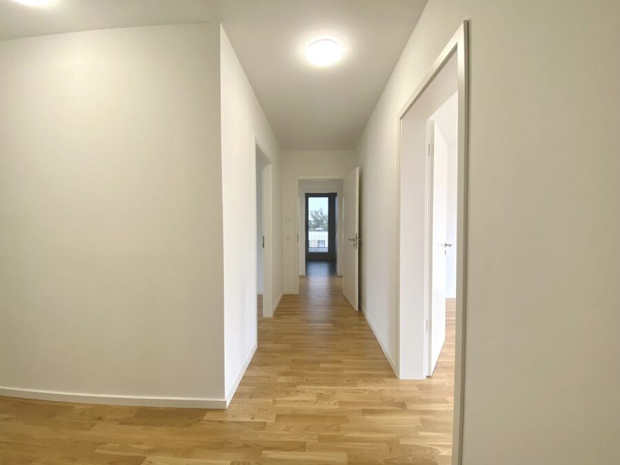 Hoch hinaus an der Mühlenau - Tolle Neubauwohnung mit Dachterrasse - Flur