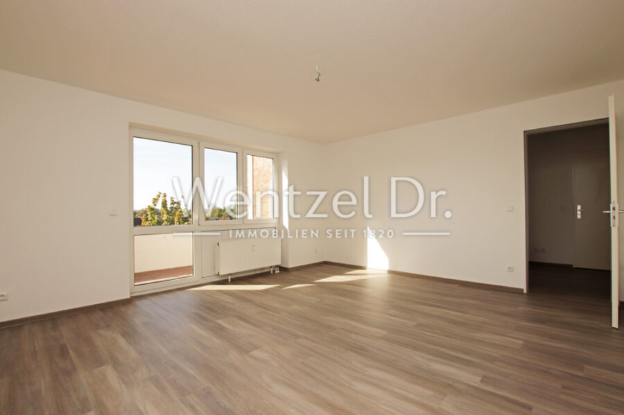 Moderne 3-Zimmer-Wohnung mit großzügigem Balkon – Ihr neues Zuhause zum Wohlfühlen in bester Lage - Wohnzimmer