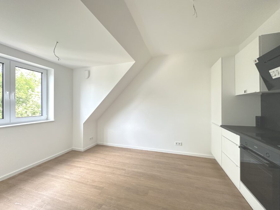 Kuschelige 1,5 Zimmer Wohnung im Neubau! - Wohn-/ Essbereich