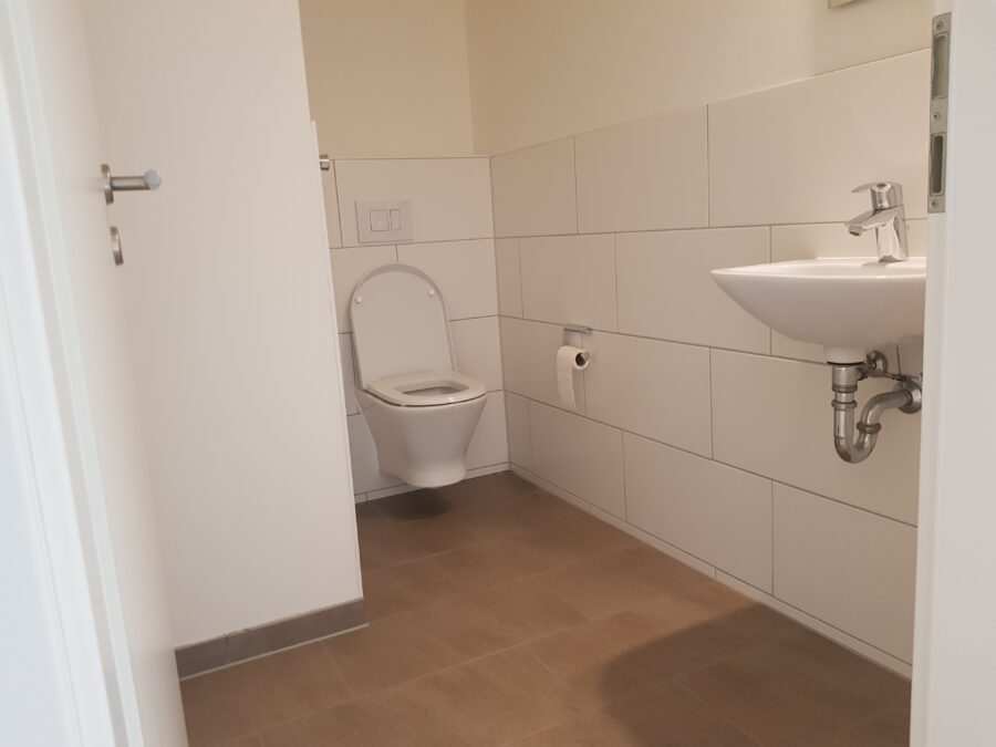 Familienfreundliche Wohnung mit sonnenverwöhnter Dachterrasse! - Gäste-WC