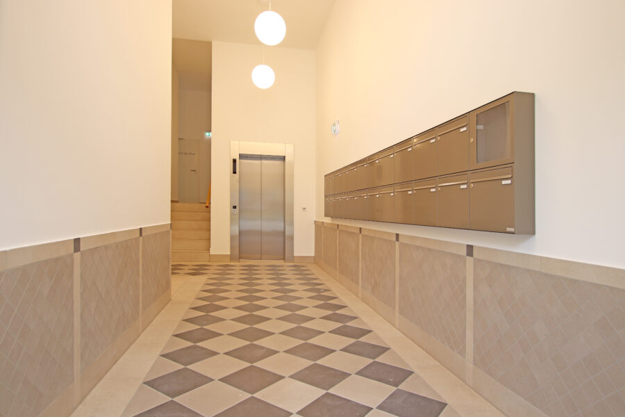 Komfortabler Erstbezug! 1-Zi-Wohnung mit EBK, Loggia und Fußbodenheizung - Eingangsbereich