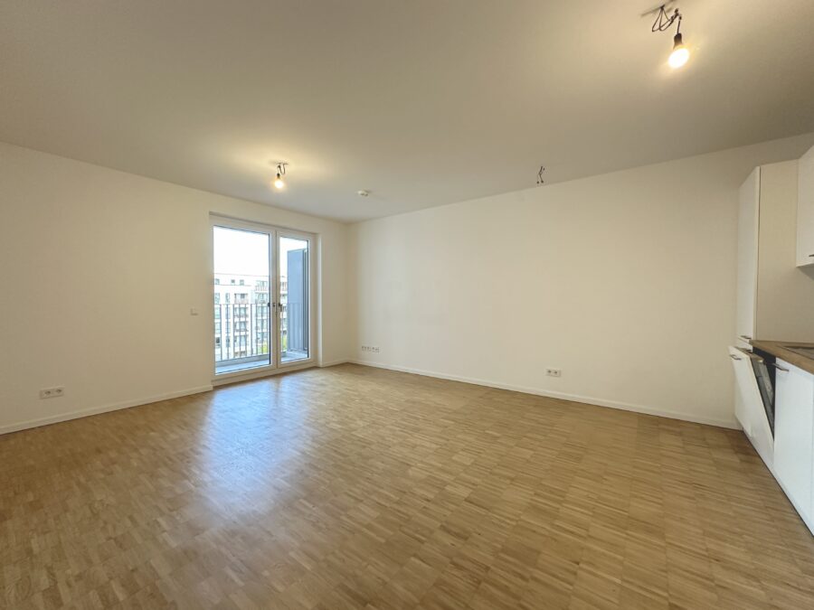 Kuschelige 3 Zimmer Wohnung im Charlie-Mills-Quartier! - Wohnbereich mit offener Küche